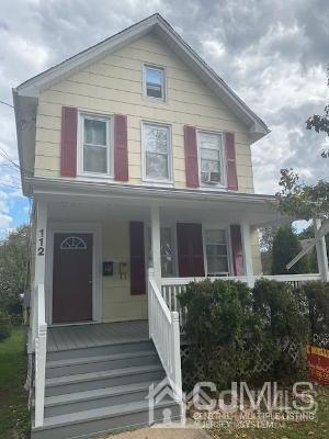 112 East Street Bound Brook, NJ 08805 - Photo 2 of 28 a front view of a house with windows