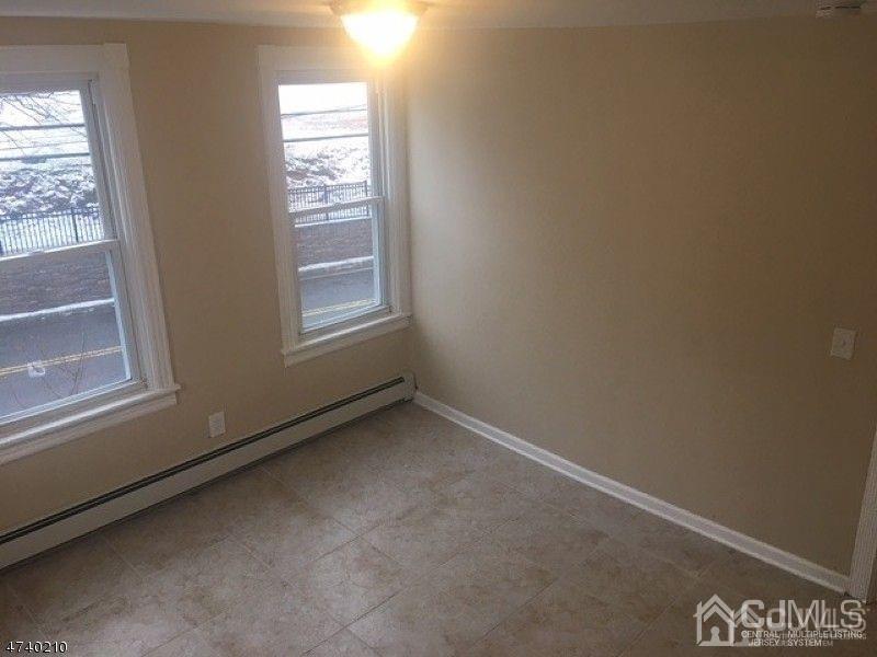 112 East Street Bound Brook, NJ 08805 - Photo 21 of 28 a view of an empty room and window