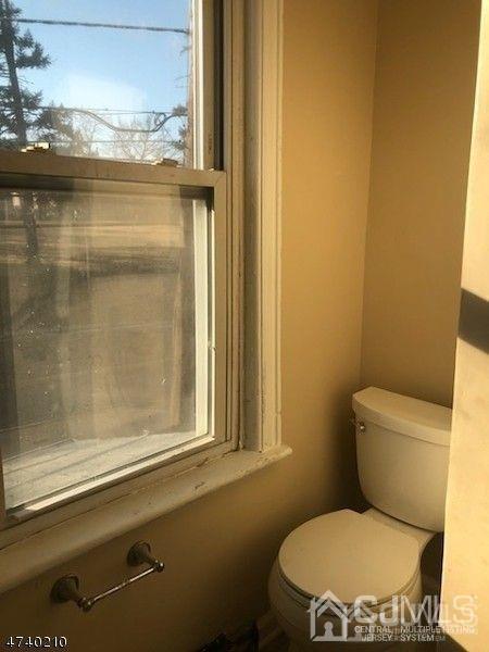 112 East Street Bound Brook, NJ 08805 - Photo 22 of 28 a bathroom with a toilet and a sink