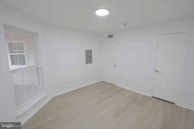 an empty room with windows