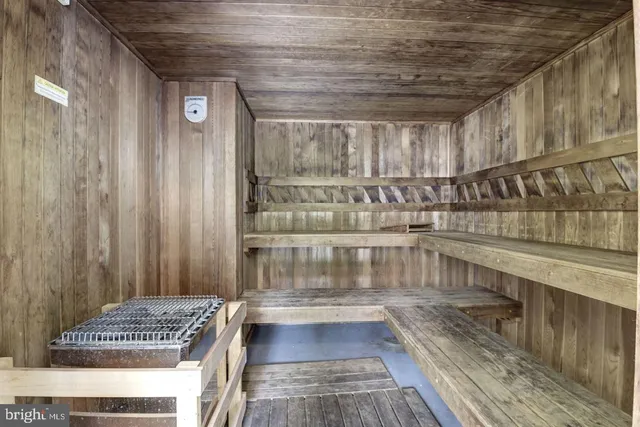 a view of a livingroom with furniture window and wooden floor