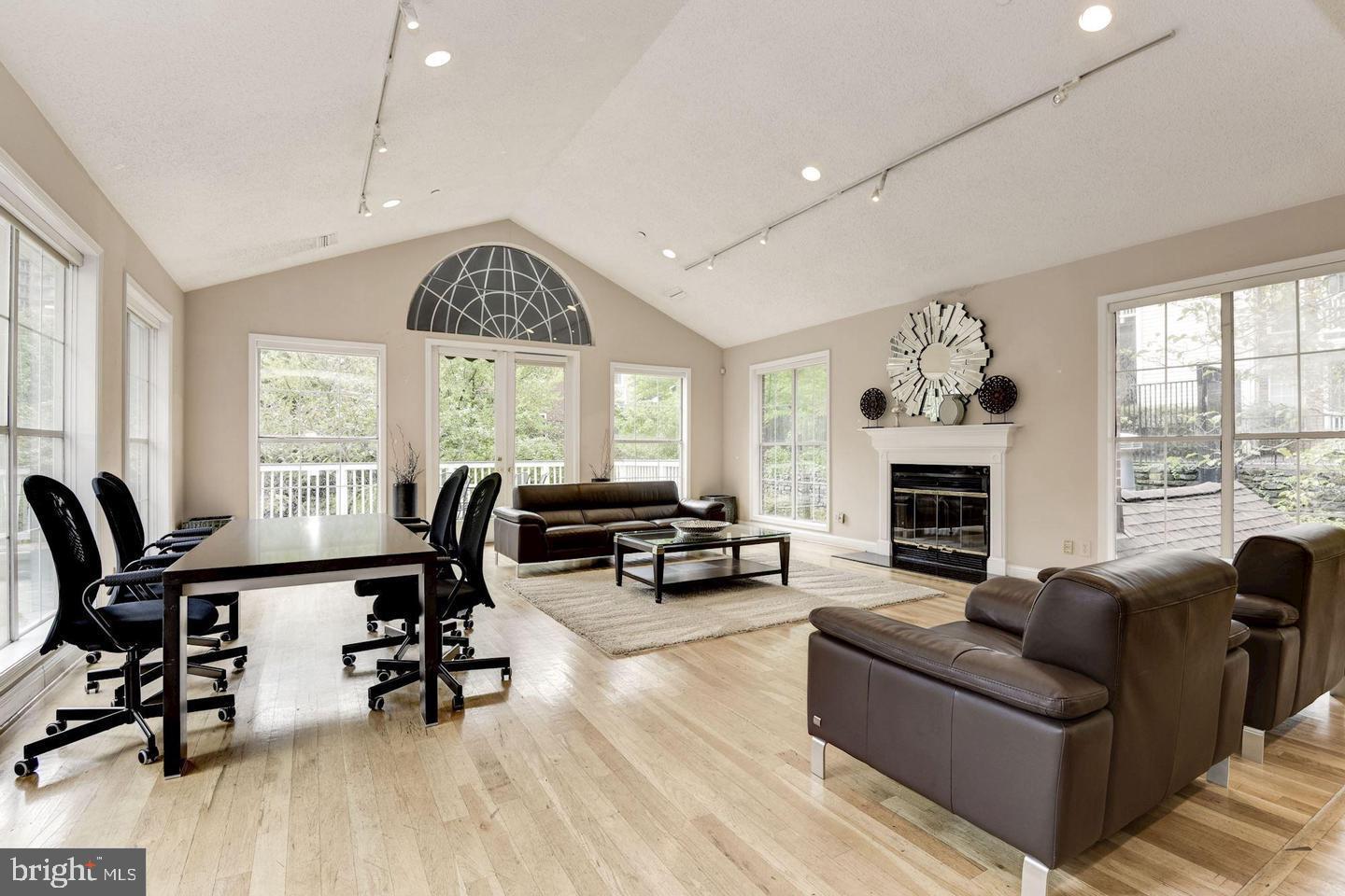 1504 Lincoln Way, Unit 104 McLean, VA 22102 - Photo 39 of 40 a living room with furniture and a fireplace