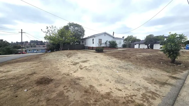 a view of an house with backyard space