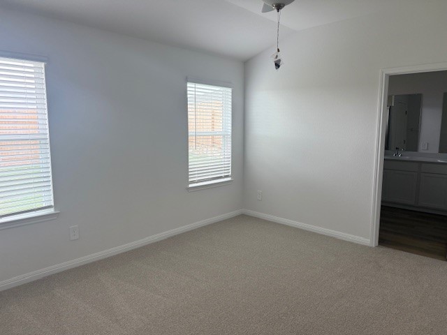 308 Gristmill Road Burnet, TX 78611 - Photo 3 of 7 an empty room with windows