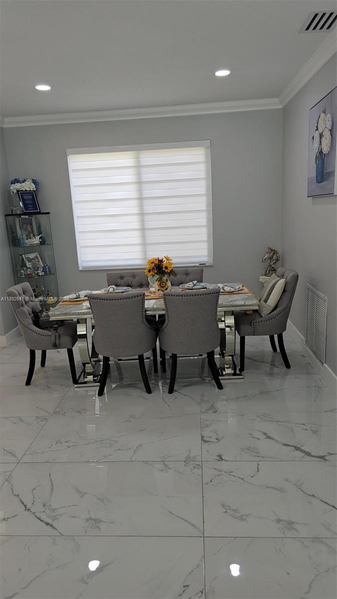 15982 Southwest 61st Street Davie, FL 33331 - Photo 12 of 28 a view of a room with gym equipment