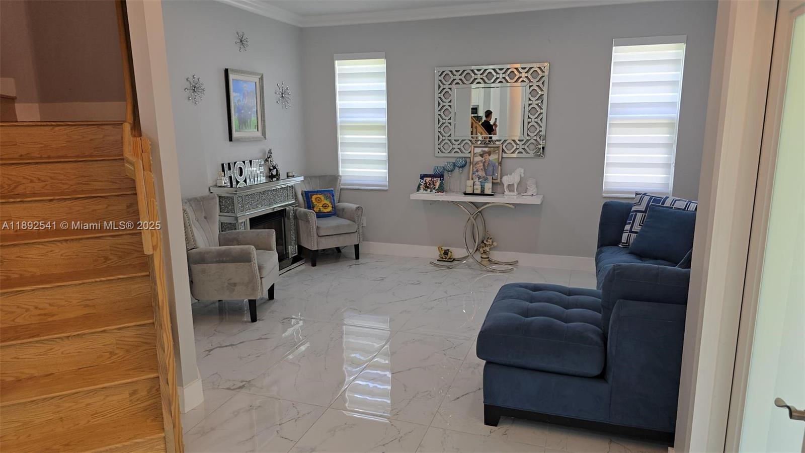 15982 Southwest 61st Street Davie, FL 33331 - Photo 6 of 28 a living room with furniture and a window