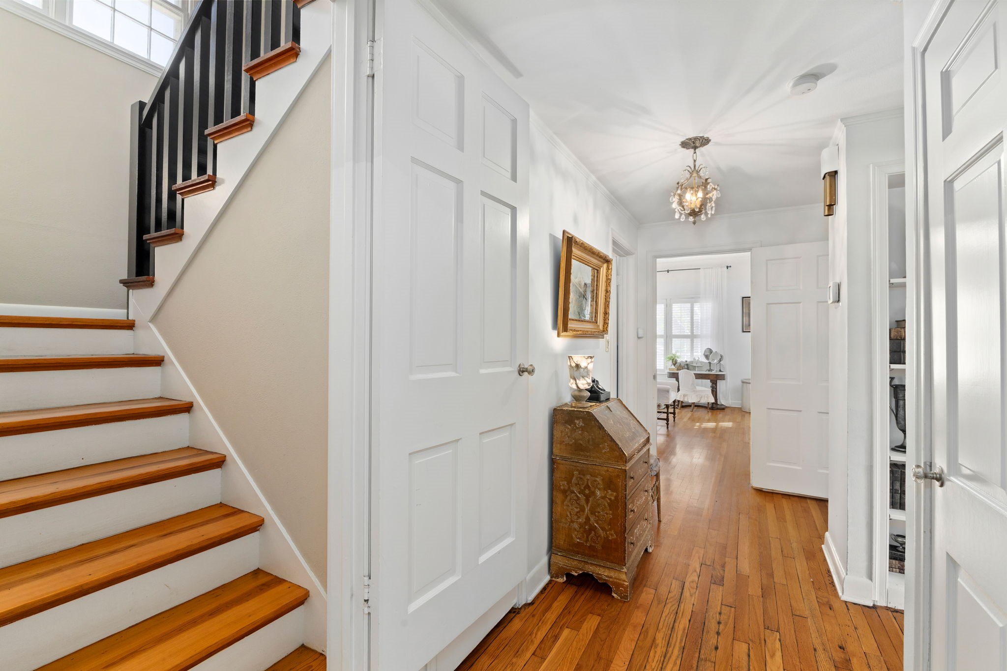 901 Anderson Street Schulenburg, TX 78956 - Photo 24 of 36 a view of a hallway with wooden floor and staircase