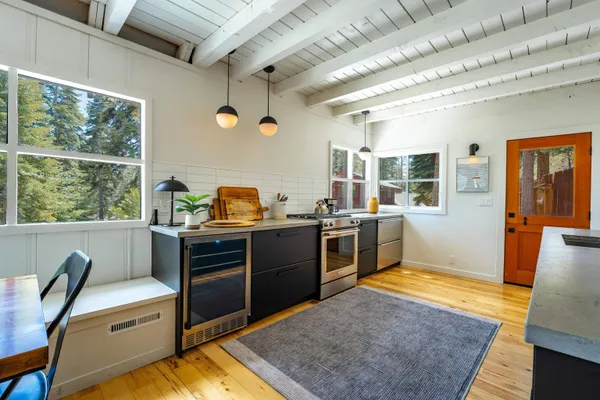 a kitchen with stainless steel appliances granite countertop a stove a sink and dishwasher