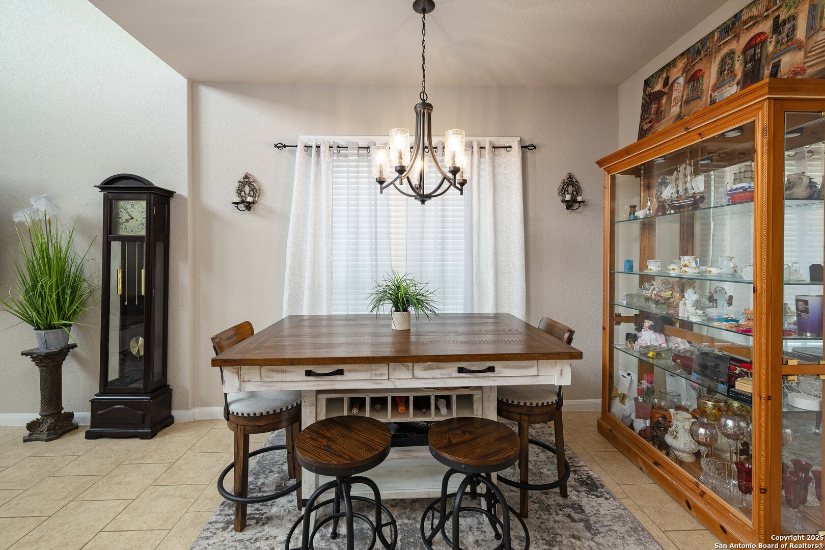 10238 Midsummer Meadow Converse, TX 78109 - Photo 11 of 35 a dining room with furniture and window