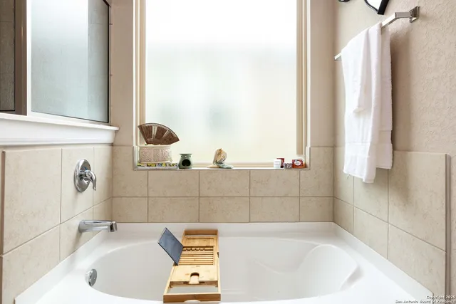 a bathroom with a bathtub