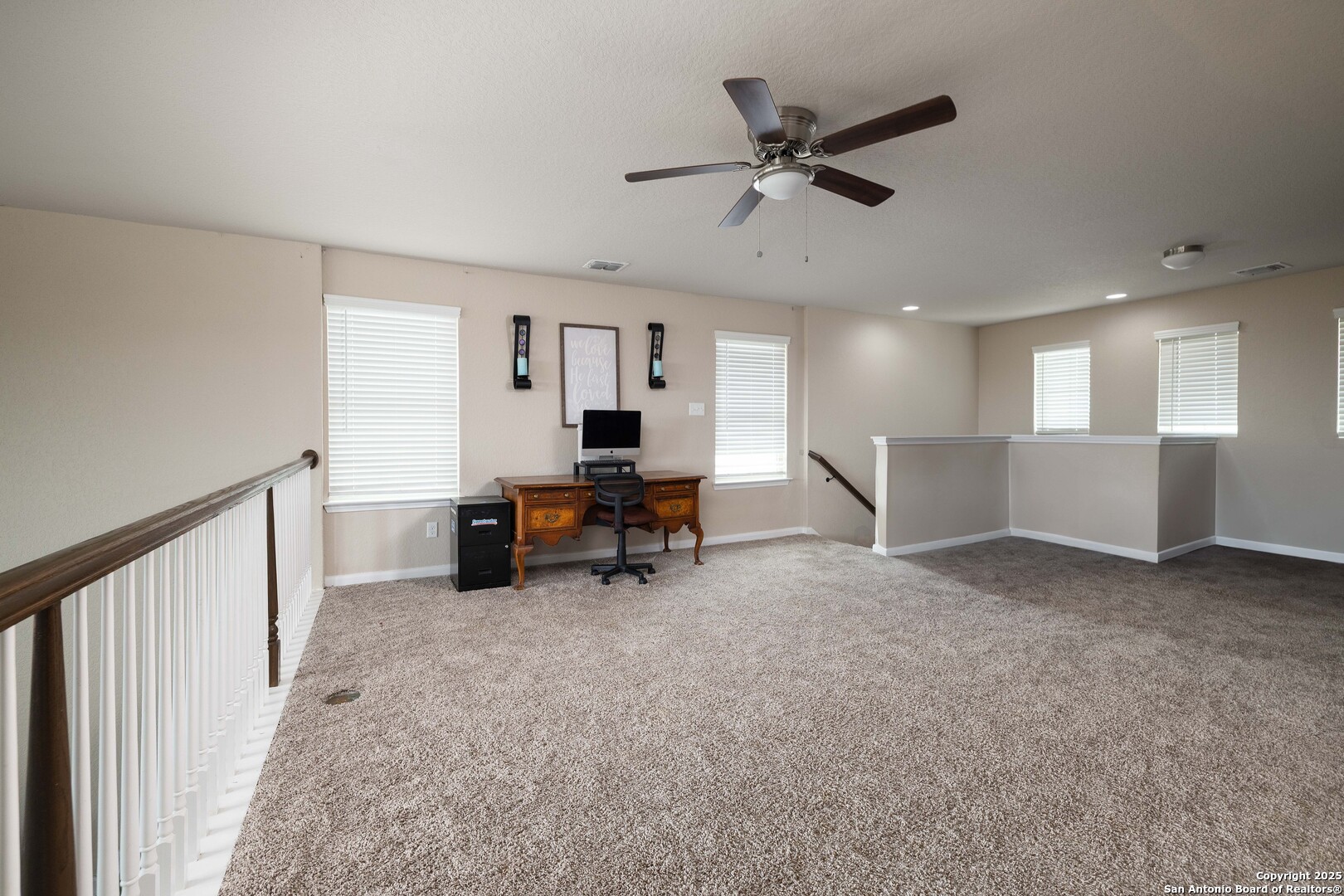 10238 Midsummer Meadow Converse, TX 78109 - Photo 21 of 35 a living room with furniture and a ceiling fan