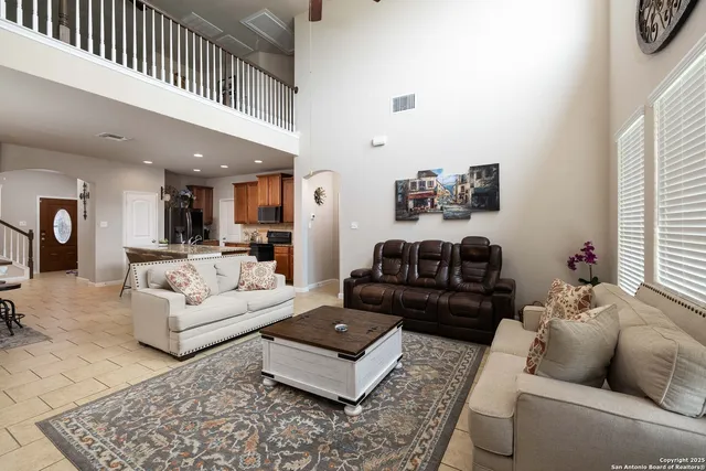 a living room with furniture and a couch