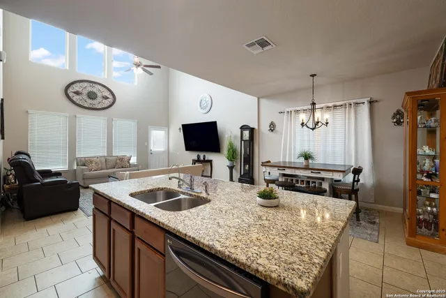 a kitchen with a counter space cabinets and stainless steel appliances