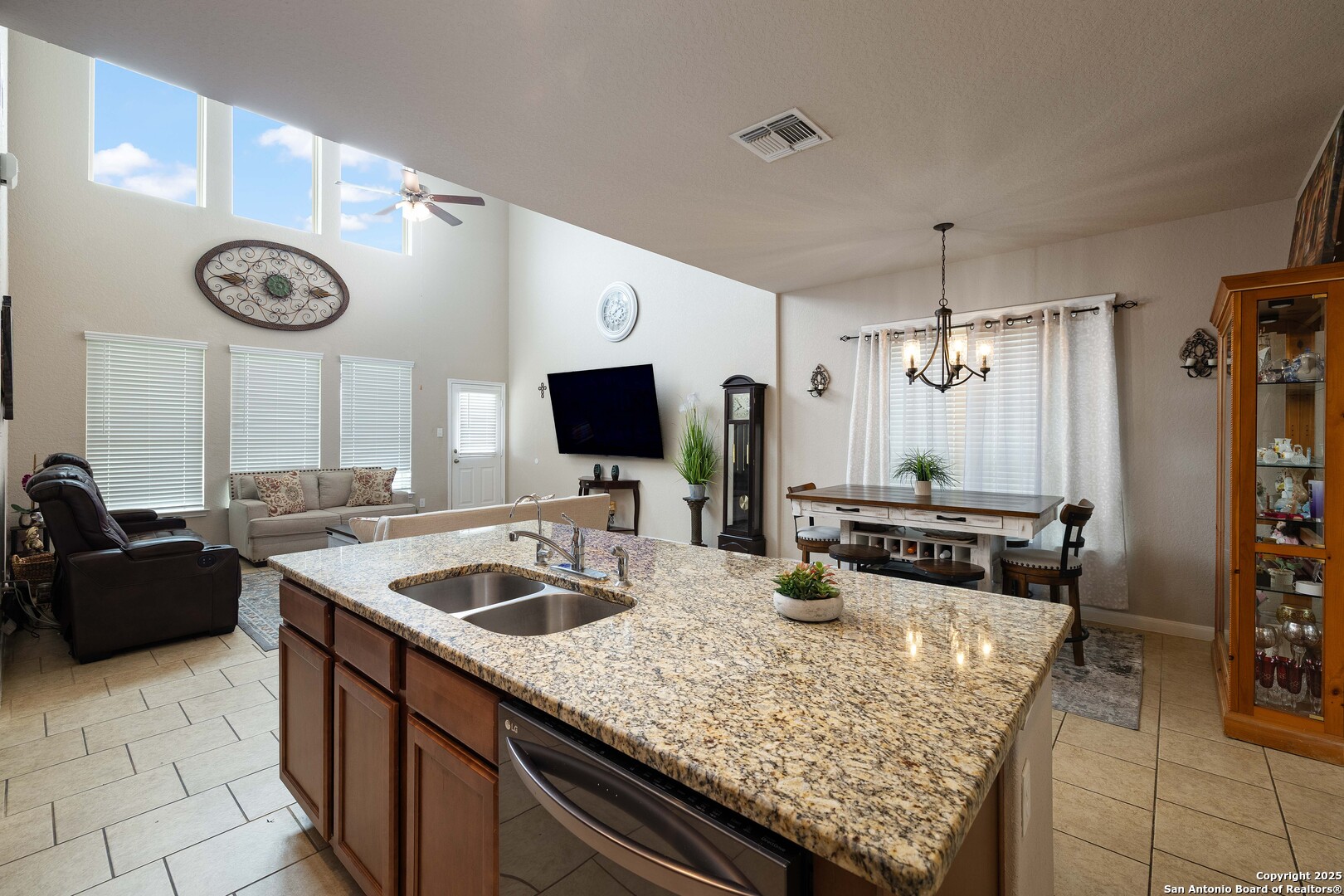 10238 Midsummer Meadow Converse, TX 78109 - Photo 9 of 35 a kitchen with a counter space cabinets and stainless steel appliances