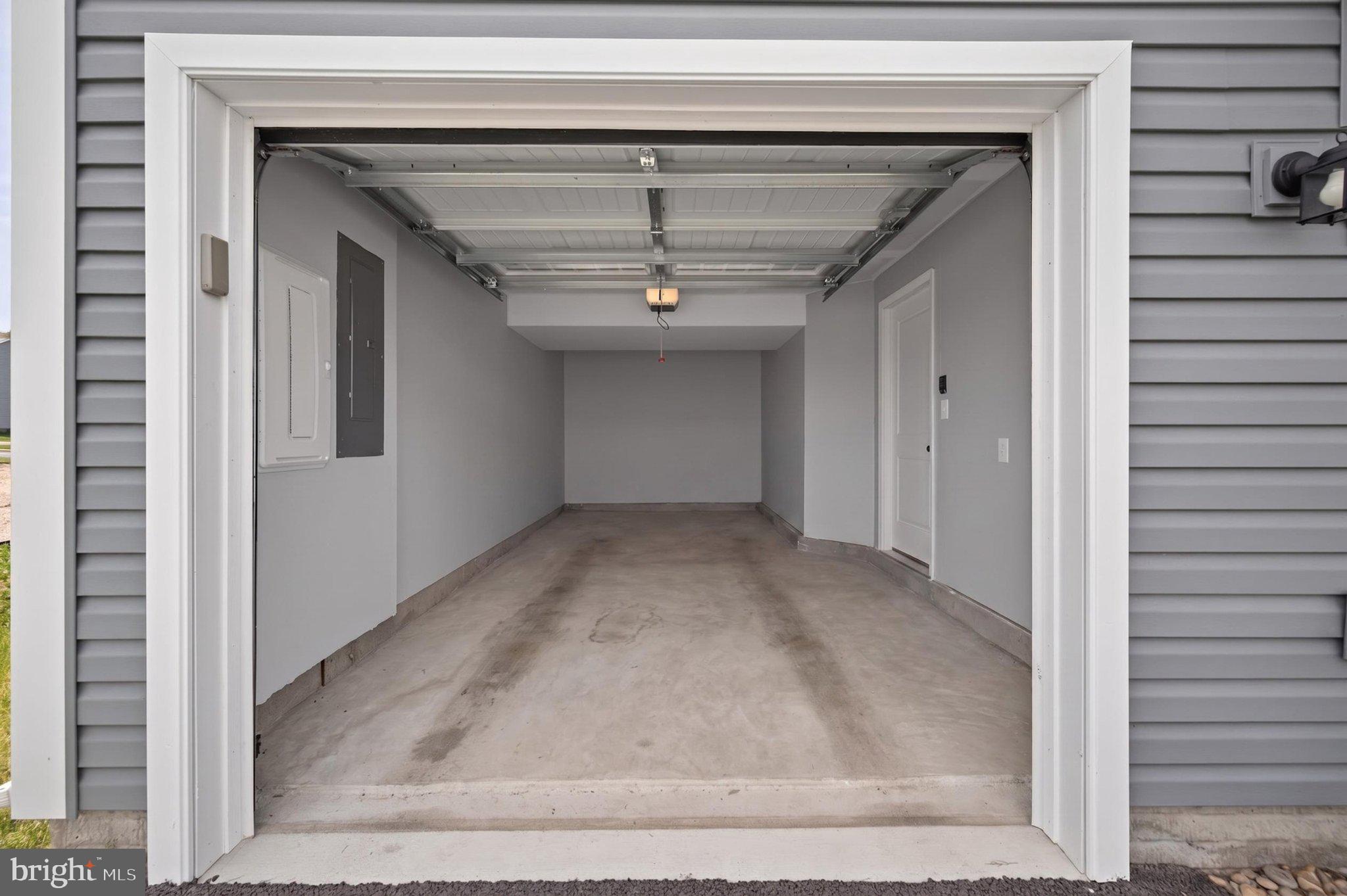 84 Tadpole Landing Road Inwood, WV 25428 - Photo 8 of 30 Spacious garage with modern design.