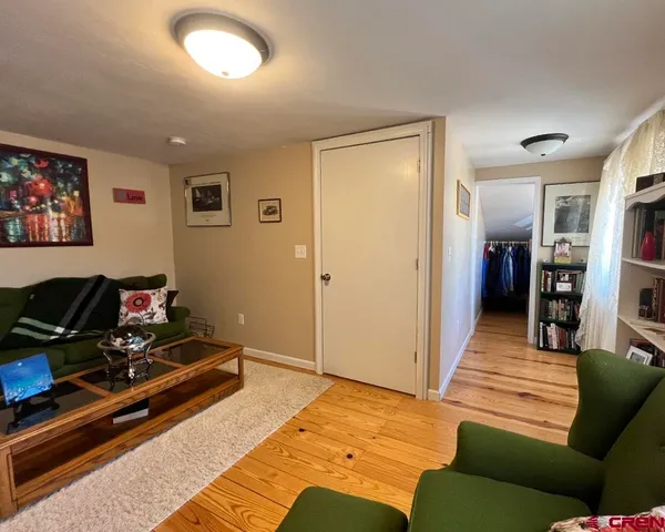 a bedroom with a bed and furniture