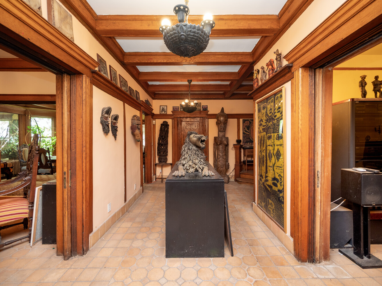 1112 Albemarle Road Brooklyn, NY 11218 - Photo 10 of 15 a view of a hallway with couch and chandelier