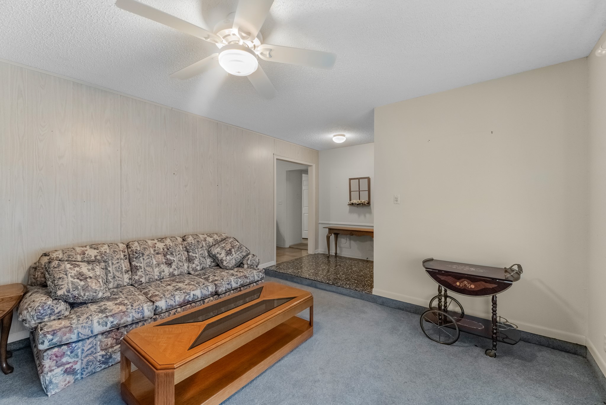 7315 Pine Street Manvel, TX 77578 - Photo 43 of 50 a living room with furniture and a fireplace