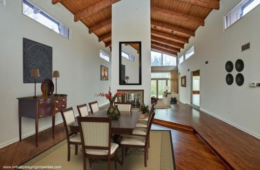 804 North Happ Road Northfield, IL 60093 - Photo 2 of 13 a dining room with furniture and wooden floor
