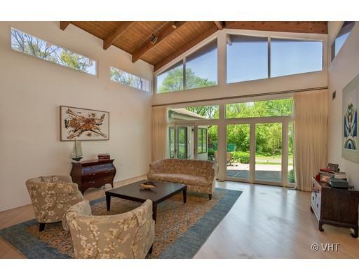 804 North Happ Road Northfield, IL 60093 - Photo 3 of 13 a living room with furniture and a large window