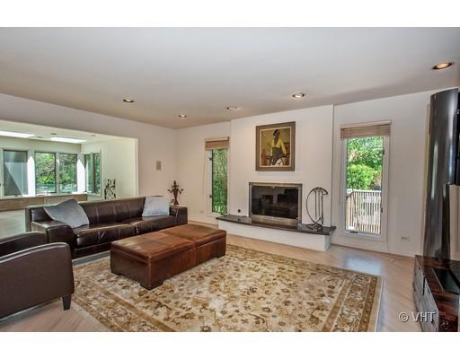 804 North Happ Road Northfield, IL 60093 - Photo 4 of 13 a living room with furniture and a fireplace