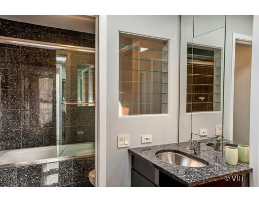 804 North Happ Road Northfield, IL 60093 - Photo 8 of 13 a bathroom with sink shower and mirror