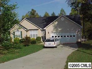 910 Cress School Road Salisbury, NC 28147 - Photo 1 of 1 a car parked in front of house with a yard