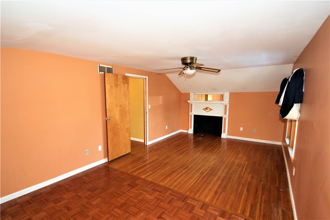 43 West Parkway Greece, NY 14616 - Photo 17 of 45 Main Primary bedroom with faux fireplace
