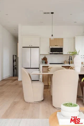 a living room with a couch and a flat screen tv