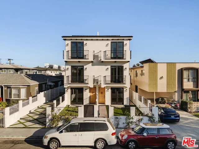 a car parked in front of a house
