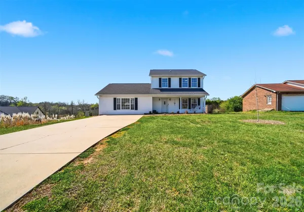a front view of house with yard