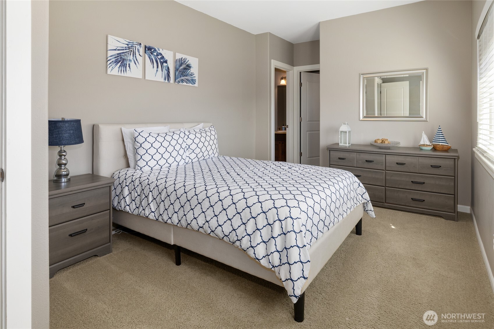 23041 Sunserra Loop Quincy, WA 98848 - Photo 28 of 38 a bedroom with a bed and a dresser in it