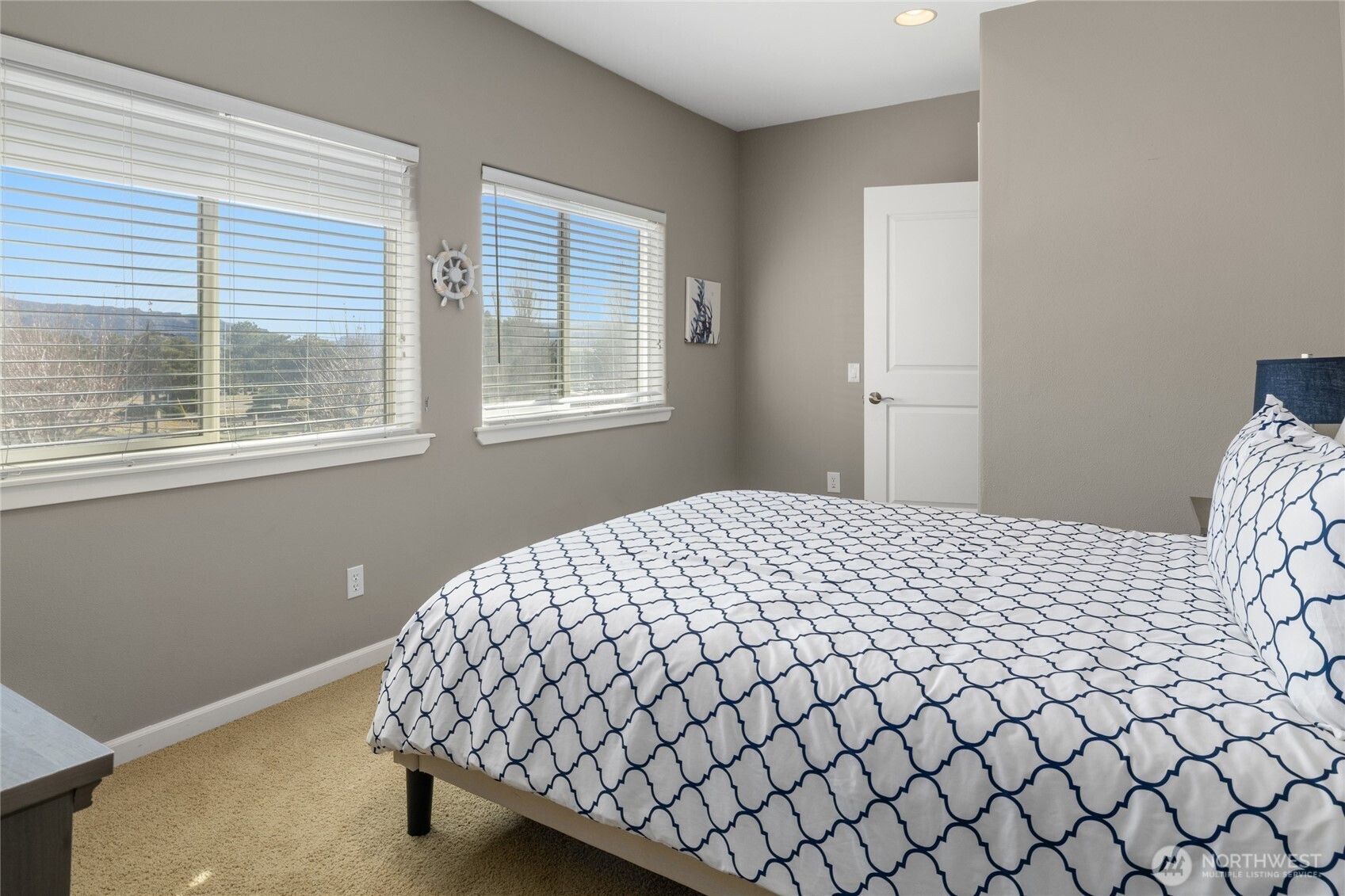 23041 Sunserra Loop Quincy, WA 98848 - Photo 29 of 38 a bedroom with a bed and a window