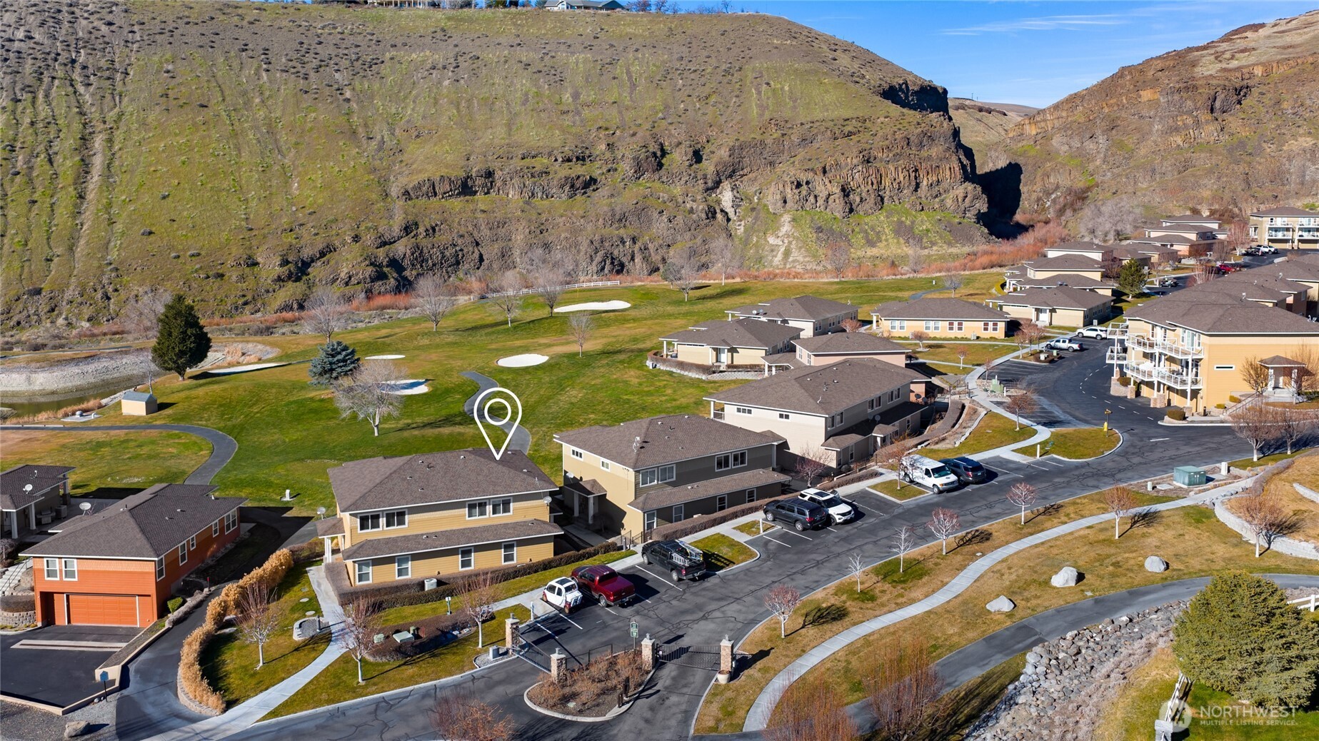 23041 Sunserra Loop Quincy, WA 98848 - Photo 36 of 38 an aerial view of a swimming pool patio and mountain view
