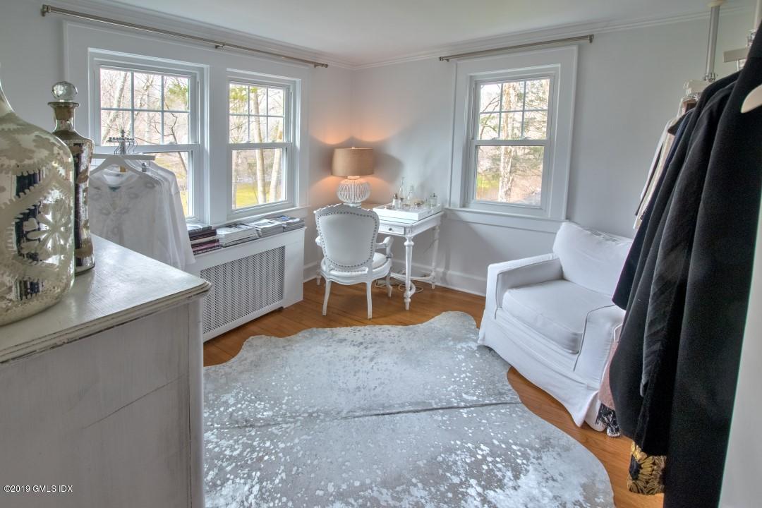 347 Riversville Road Greenwich, CT 06831 - Photo 17 of 22 a living room with furniture and a window