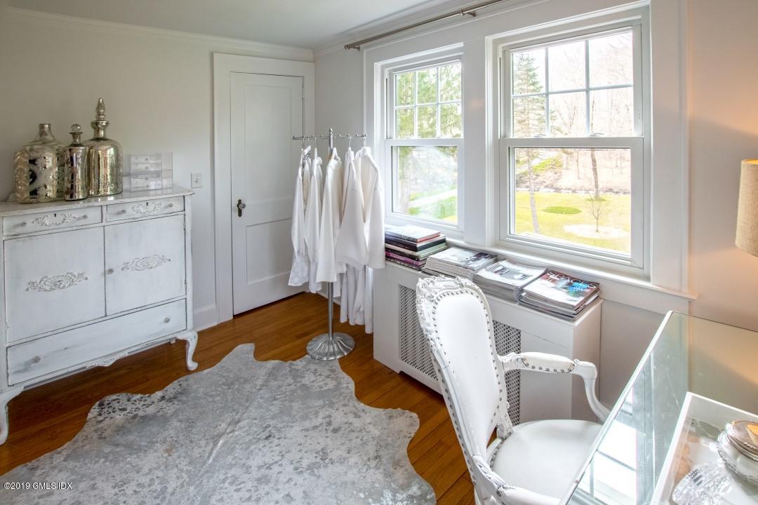 347 Riversville Road Greenwich, CT 06831 - Photo 18 of 22 a living room with furniture and a window