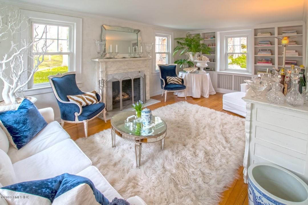 347 Riversville Road Greenwich, CT 06831 - Photo 4 of 22 a living room with furniture and a fireplace