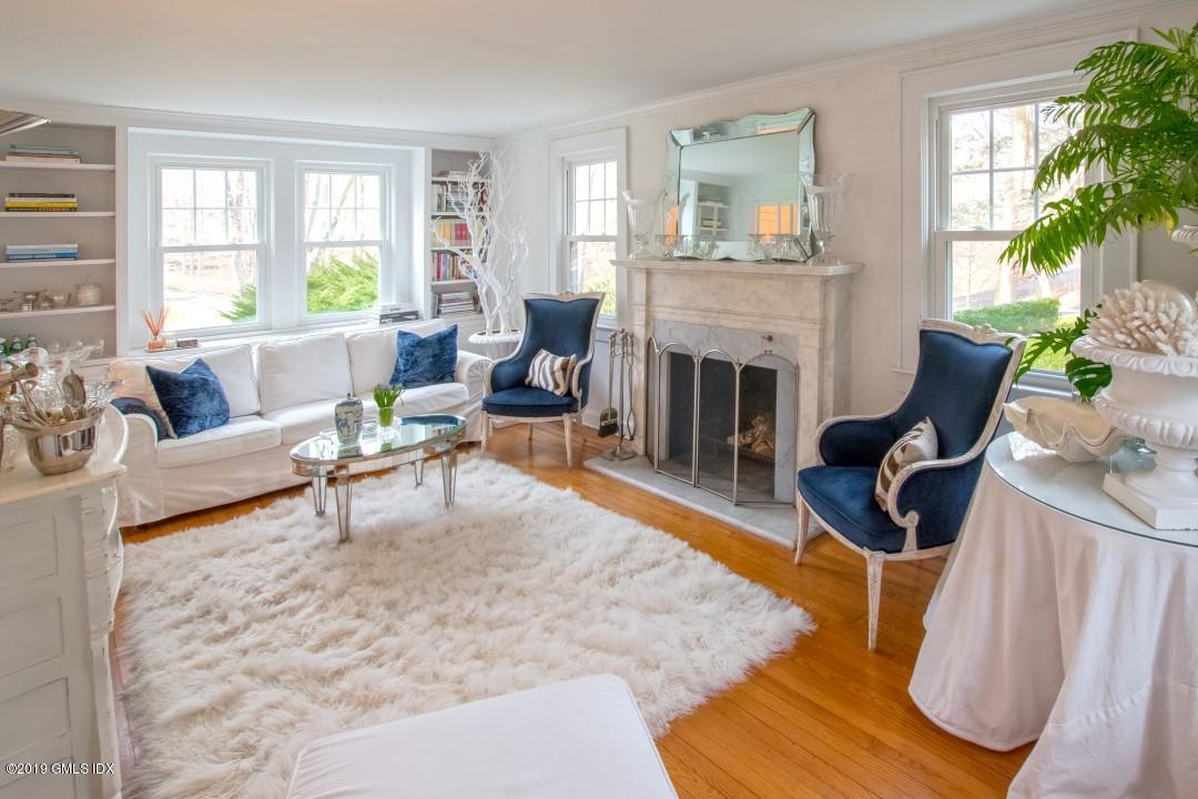 347 Riversville Road Greenwich, CT 06831 - Photo 5 of 22 a living room with furniture a window and a fireplace
