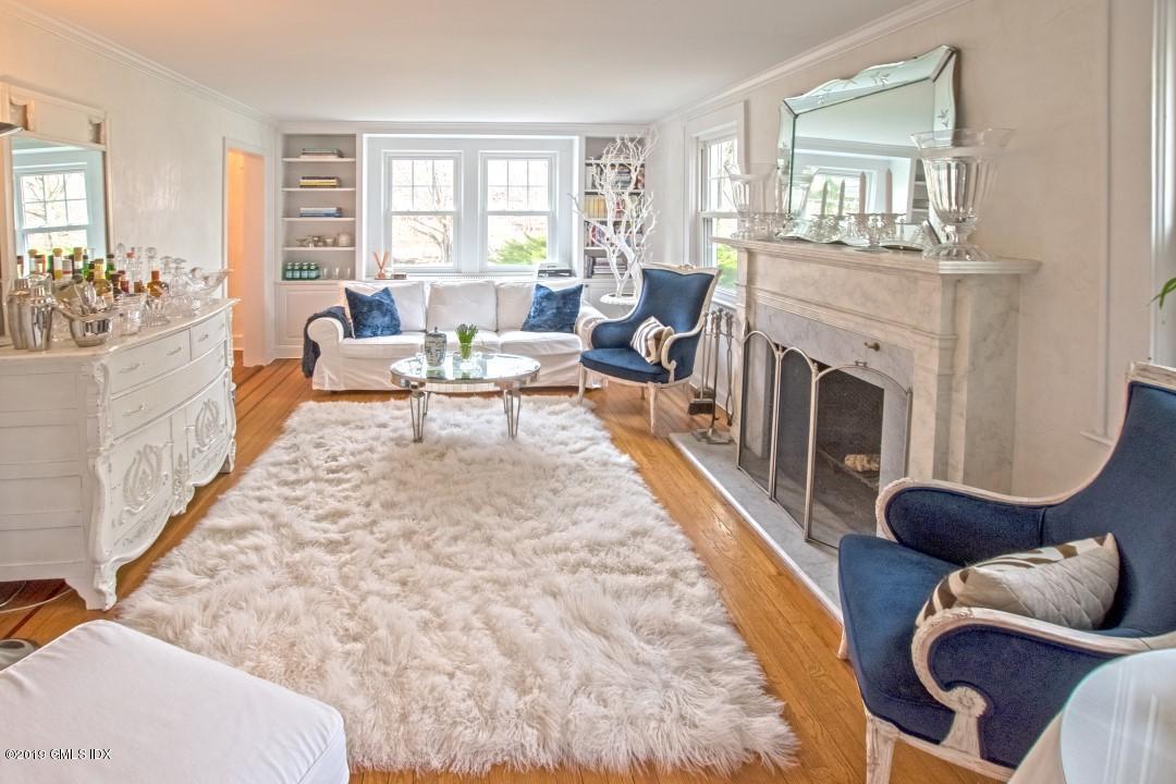 347 Riversville Road Greenwich, CT 06831 - Photo 6 of 22 a living room with furniture and a fireplace