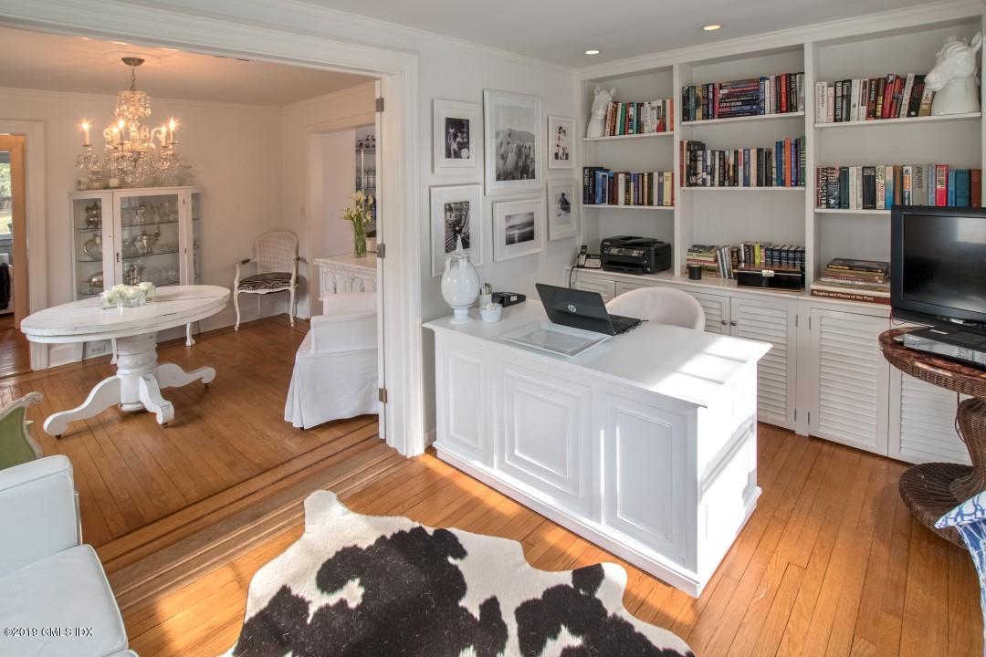 347 Riversville Road Greenwich, CT 06831 - Photo 10 of 22 a living room with furniture and a flat screen tv