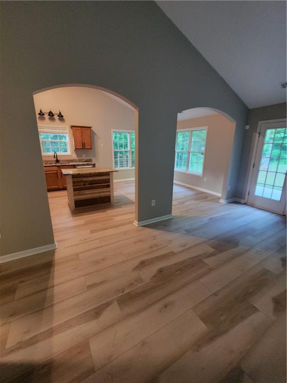 435 Butler Bridge Circle Covington, GA 30016 - Photo 22 of 25 a living room with furniture and a wooden floor