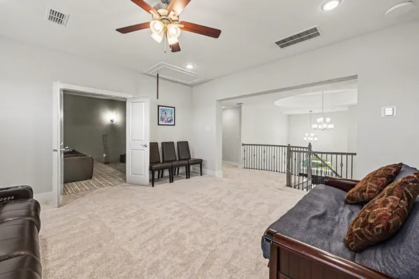 a living room with furniture and a rug