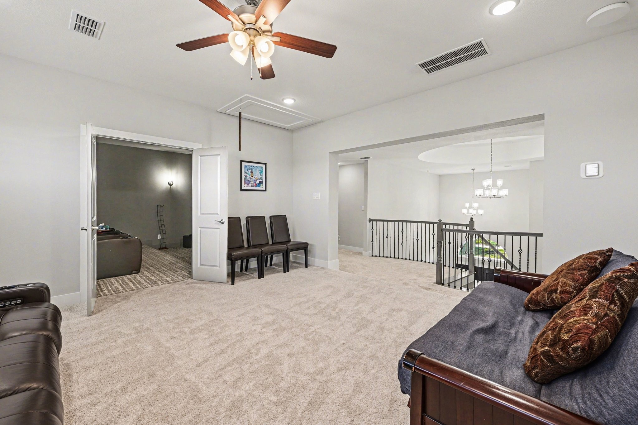 2311 Legends Way Katy, TX 77493 - Photo 23 of 50 Open railing overlooks the grand foyer below, enhancing the home’s airy, open-concept feel while maintaining a sense of privacy upstairs.