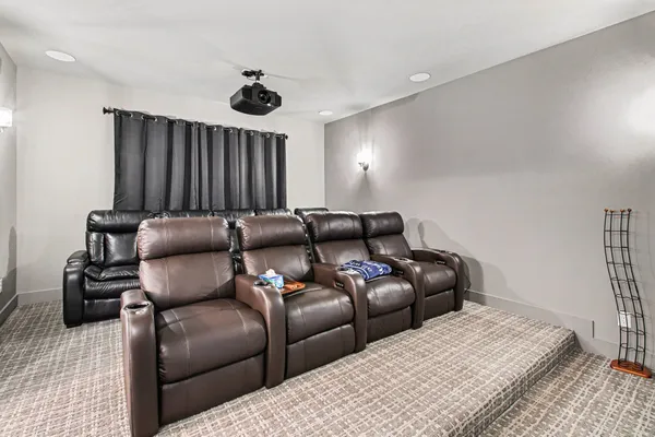 a projector room with a couch