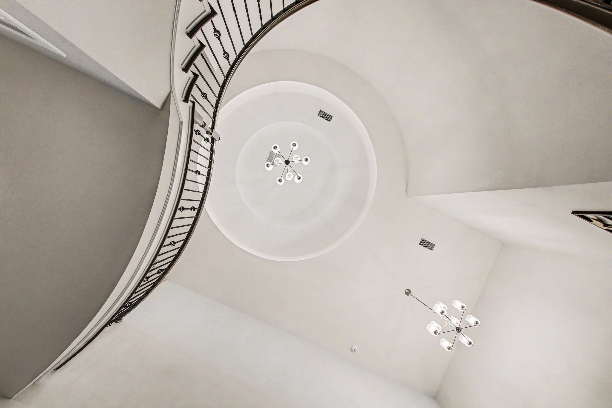 2311 Legends Way Katy, TX 77493 - Photo 8 of 50 Rotunda foyer with chandelier, winding staircase with stylish wrought iron balusters leading to the second floor game room.