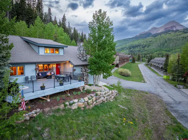 a outdoor living space with furniture and city view