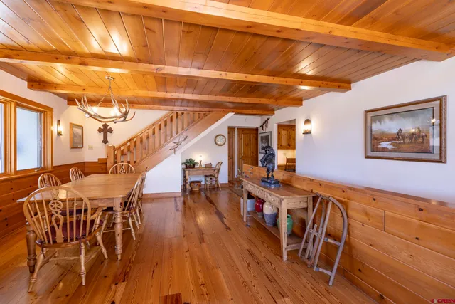 a kitchen with wooden cabinets and a stove