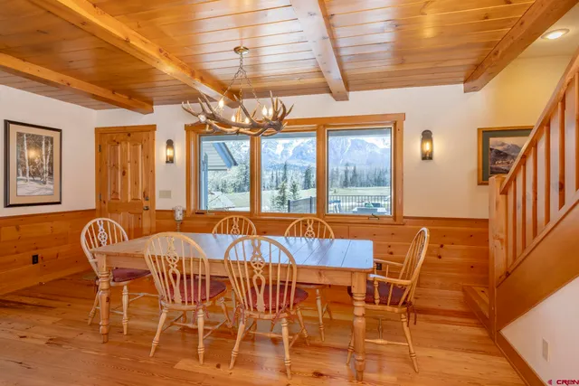 a kitchen with refrigerator and window