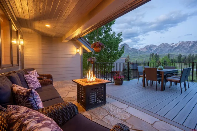 swimming pool view with a seating space