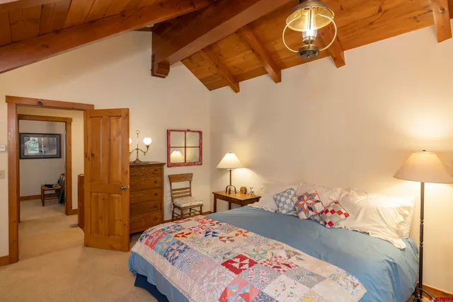 a view of a swimming pool with a bench